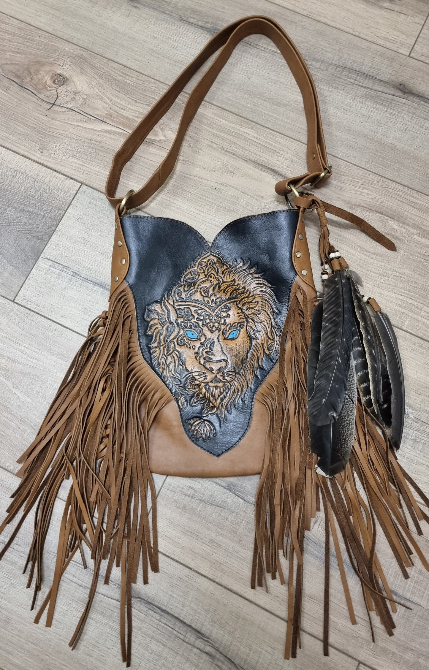 Leather Bag Lion with feathers and tassels