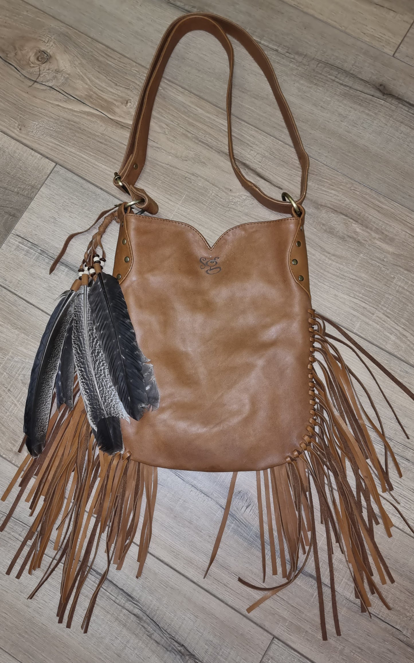 Leather Bag Lion with feathers and tassels