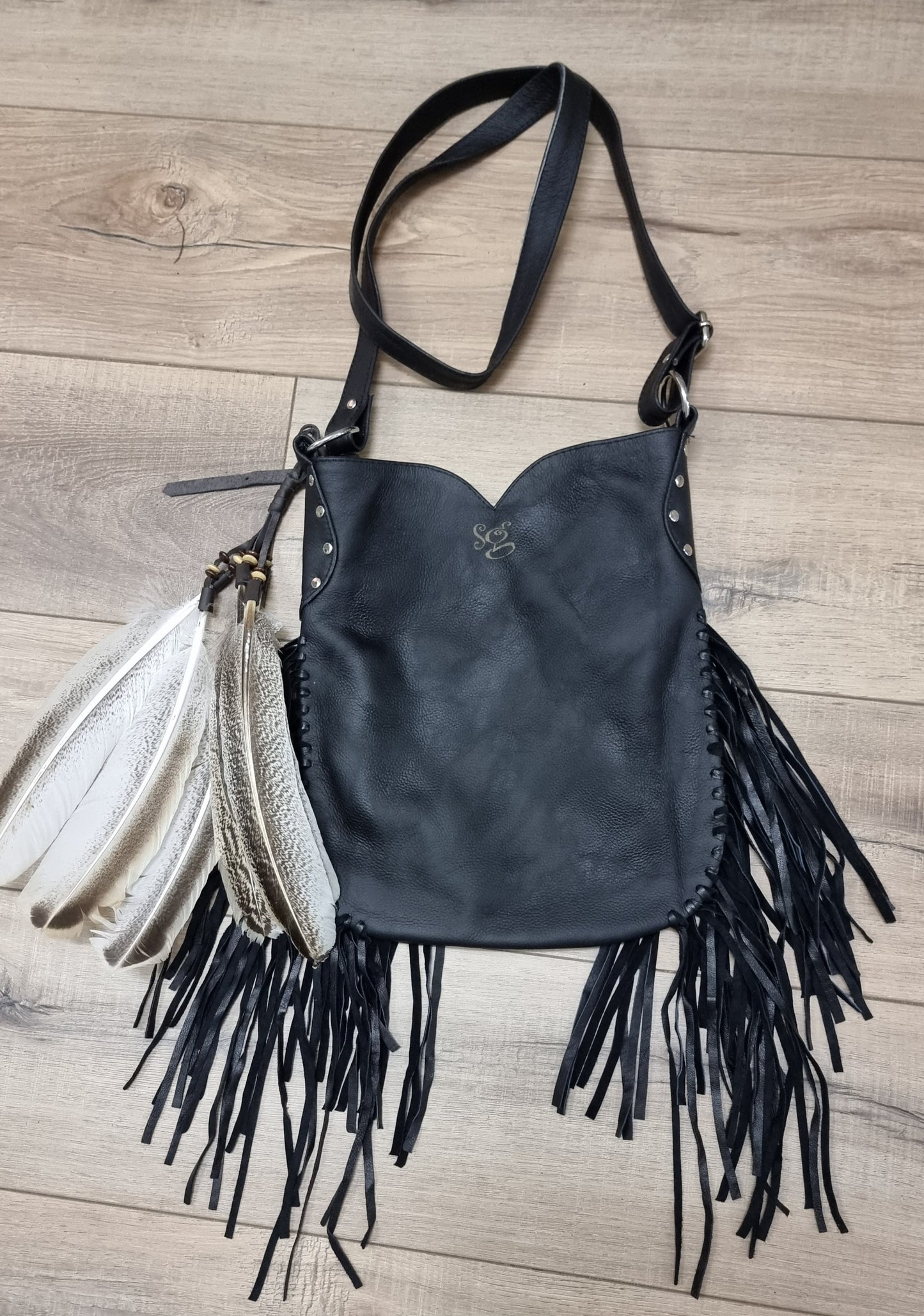 Leather Bag Lion with feathers and tassels